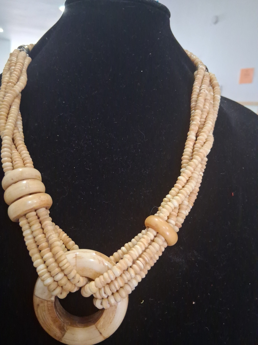 Multi-Strand Cream Beaded Statement Necklace with Ring Pendant